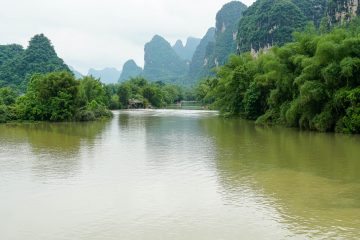 landscape shot of beautiful natural riverway with karst mountains in one of chinas most popular t20 P13djQ